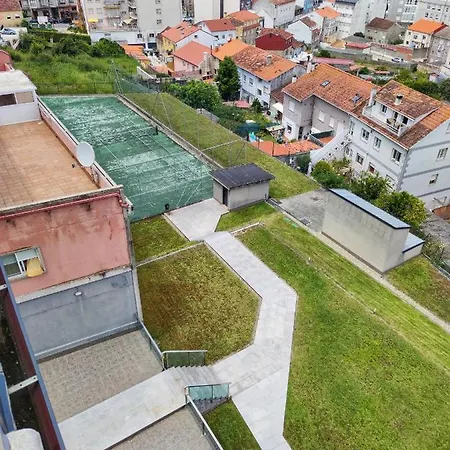 Апартаменты Desconectaengalicia Atico La Perla, Piscina Y Pista Tenis Санхенхо